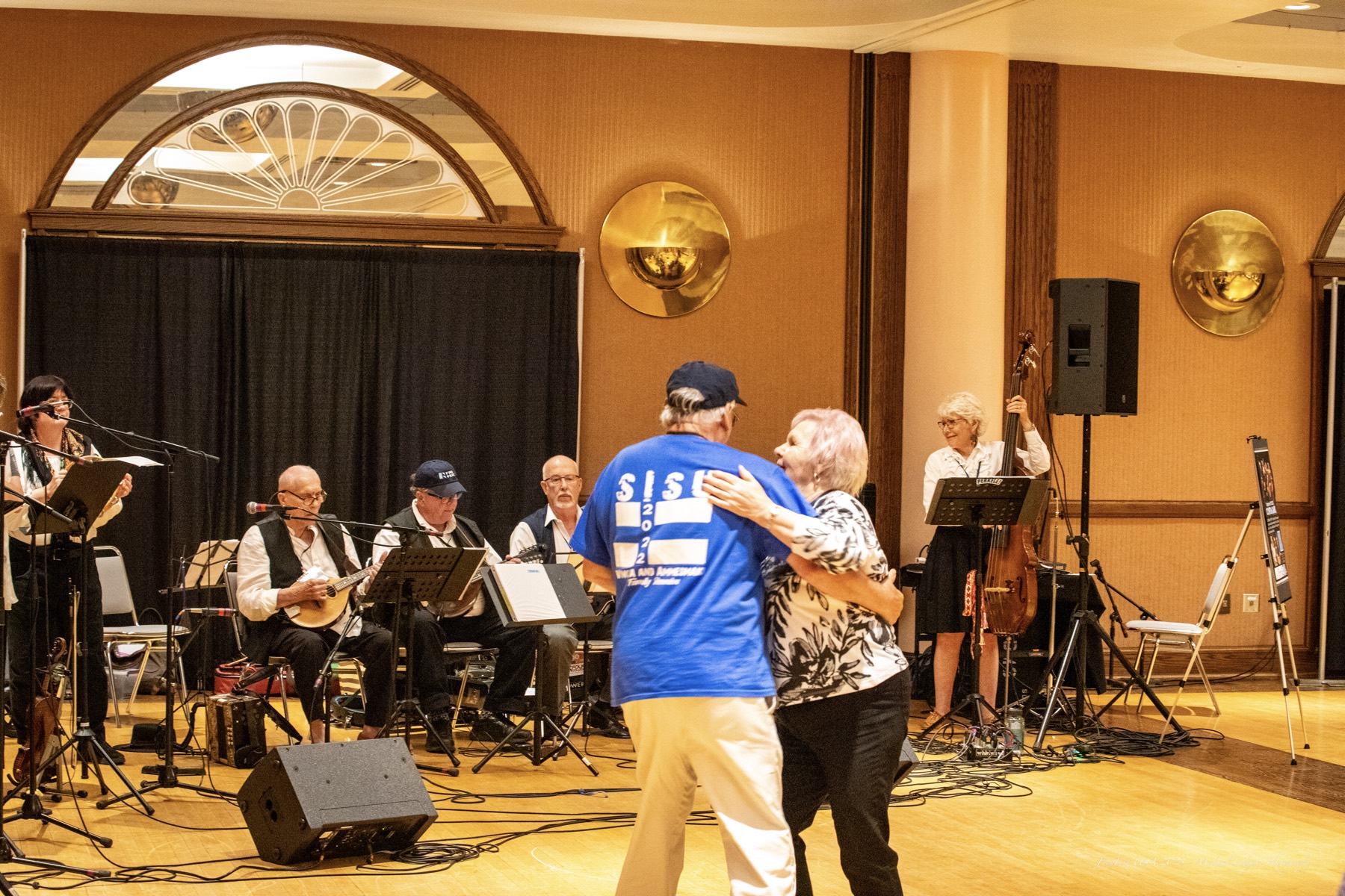 Dancers and a live band at a FinnFest music gathering